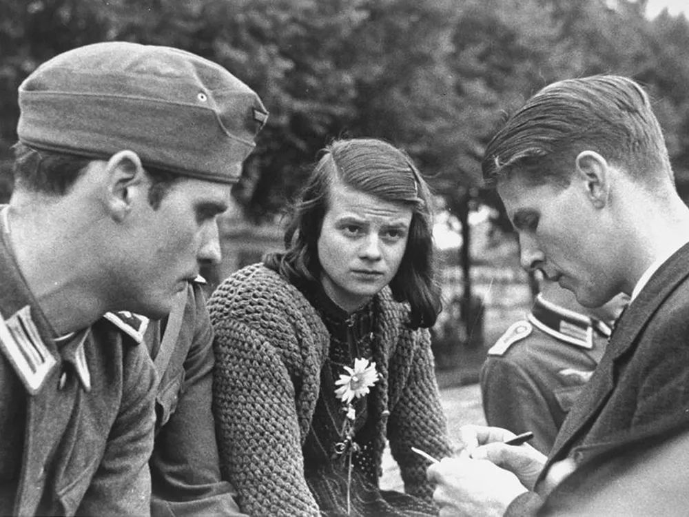 Black and white photo of Hans Scholl, Sophie Scholl, and Christoph Probst, three members of White Rose who were executed for distributing anti-Nazi leaflets in Germany in 1943