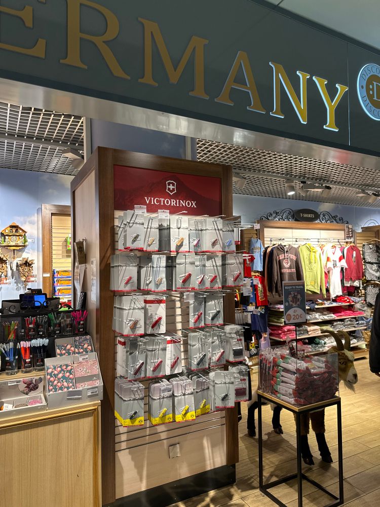 A display of pocket knives in a German airport- in the boarding area