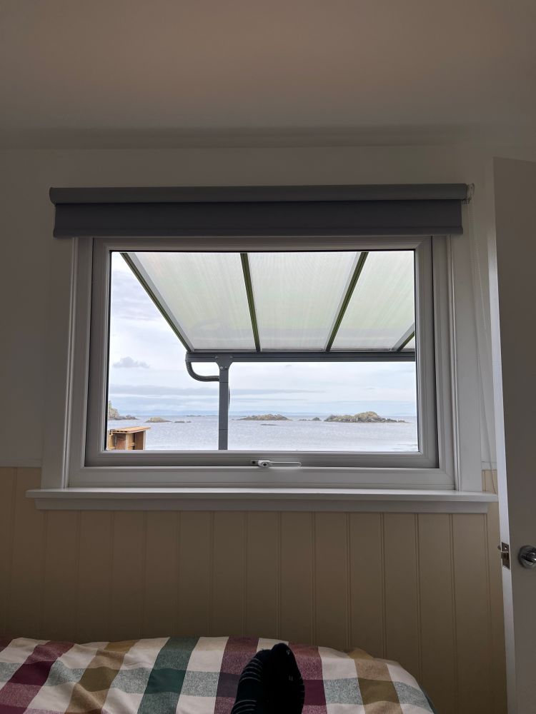 View of Lagavulin Bay through a bedroom window.