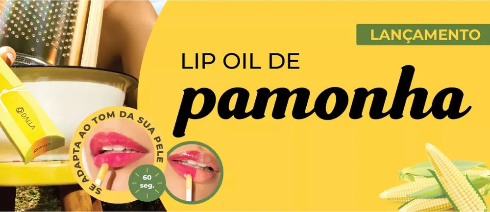 anúncio do lip oil de pamonha da marca dalla. na imagem dá pra ver parte de alguns milhos verdes no canto inferior direito, sugestões de uso em bocas recortadas mais no centro e parte da embalagem do produto no lado esquerdo. pavor.