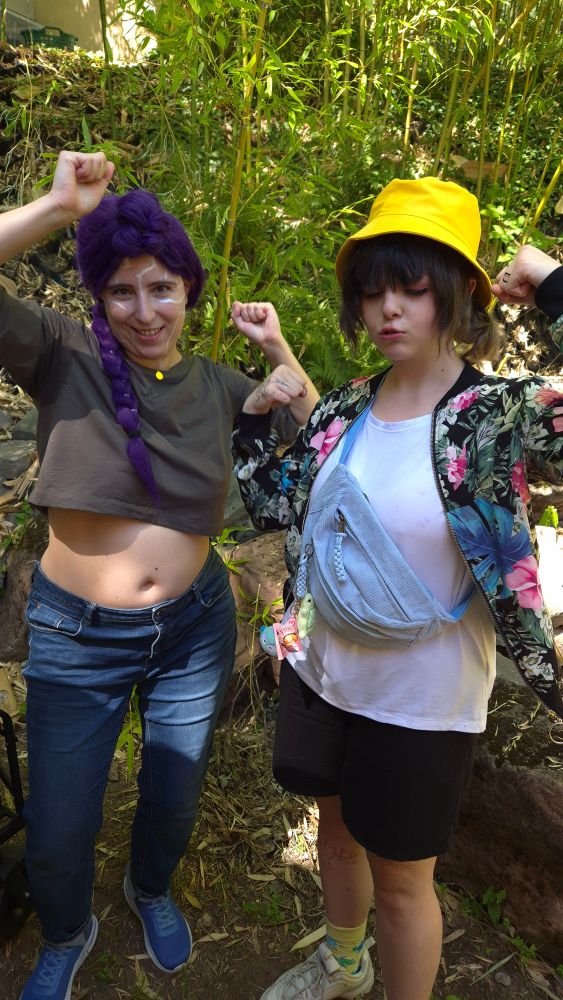 Me and Zoey again waving our fists in the air chanting "couch, couch, couch".