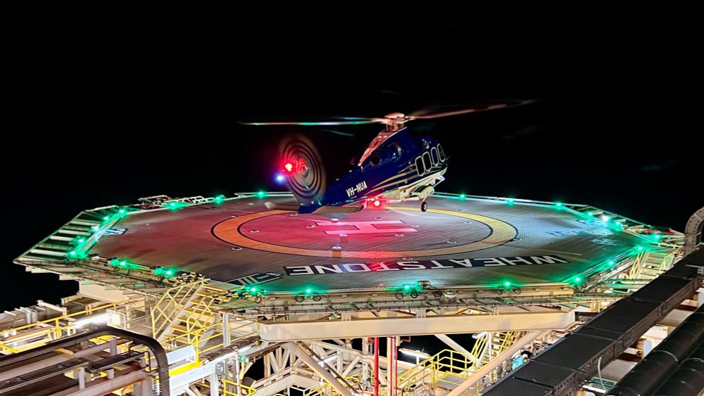 Helicopter landing on a offshore platform at night