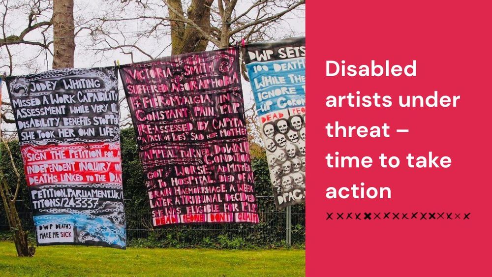 Shrouds with painted text hanging in a line outside with trees in the background. Painted onto them are numerous stories of disabled people's experience with the welfare system.