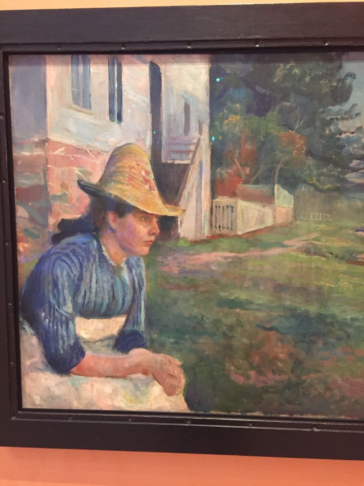 quadro de munch com uma paisagem rural ao fundo e uma moça com olhar deprimido no primeiro plano