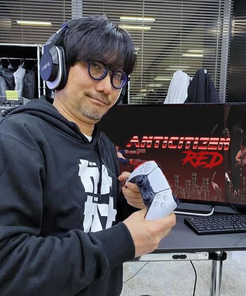It’s beloved movie watcher Hideo Kojima playing the Anticitizen Red demo. He looks really pleased to be playing such a cool game with his friends, maybe even Best Friends, from Queebly Software