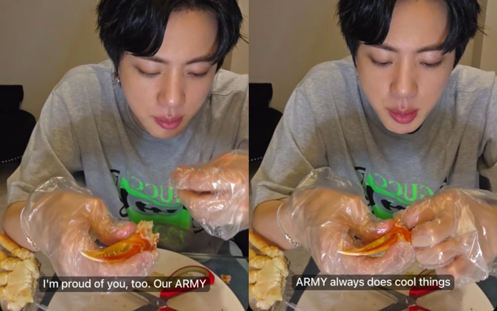 Seokjin in gray shirt, eating crab legs