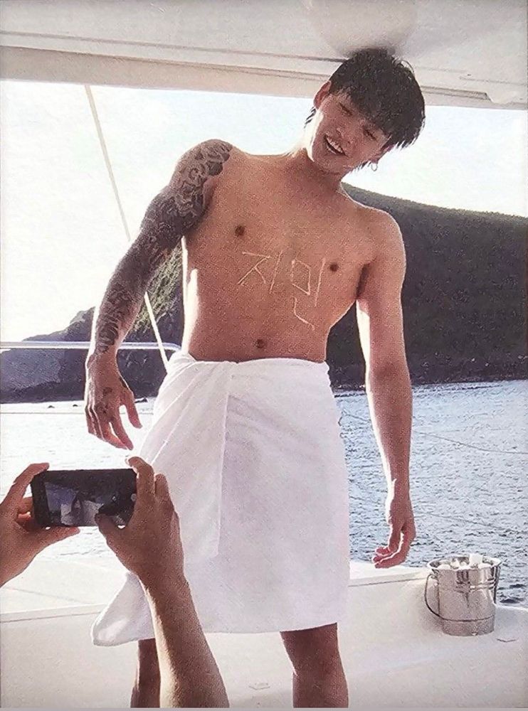 jungkook shirtless and in a towel posing for jimin with jimin’s name spelled in sunscreen on his chest. they’re on a boat. what a possessive mimi
