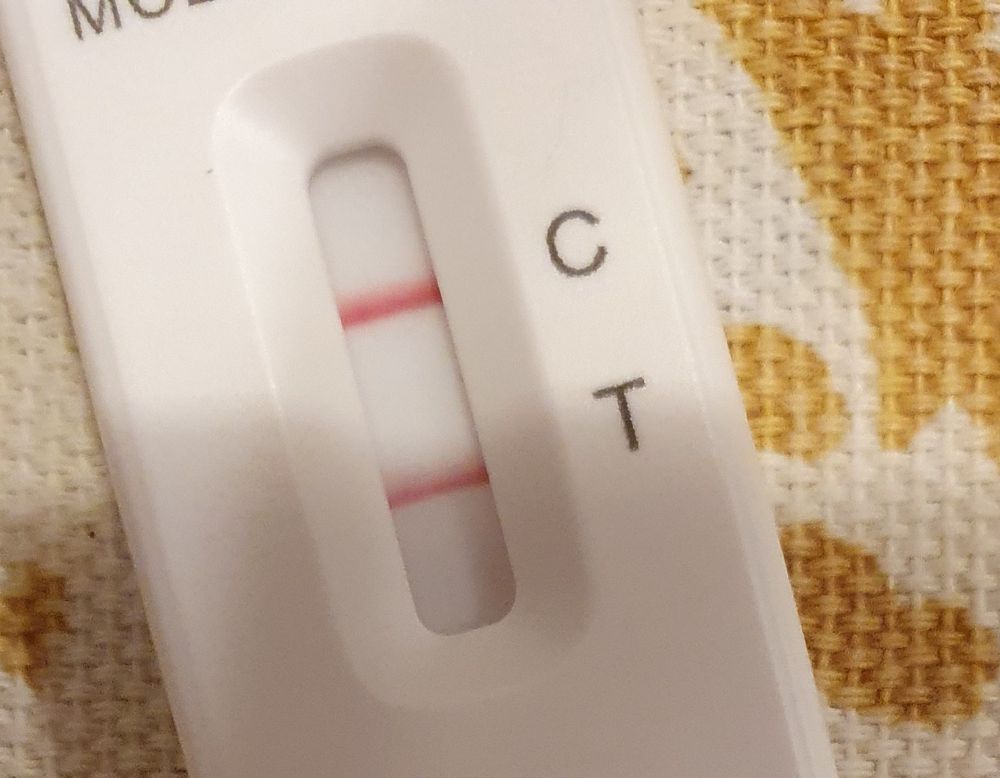 A positive covid test strip