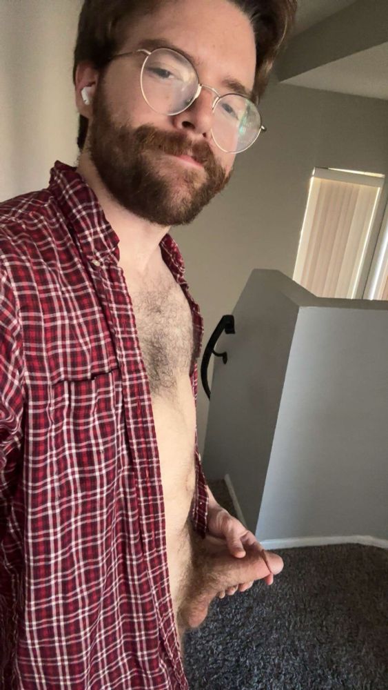 pic of me grabbing my peen while wearing a red flannel in my living room