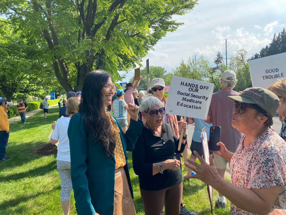 Local politician Kristin Mink talks to constituents 