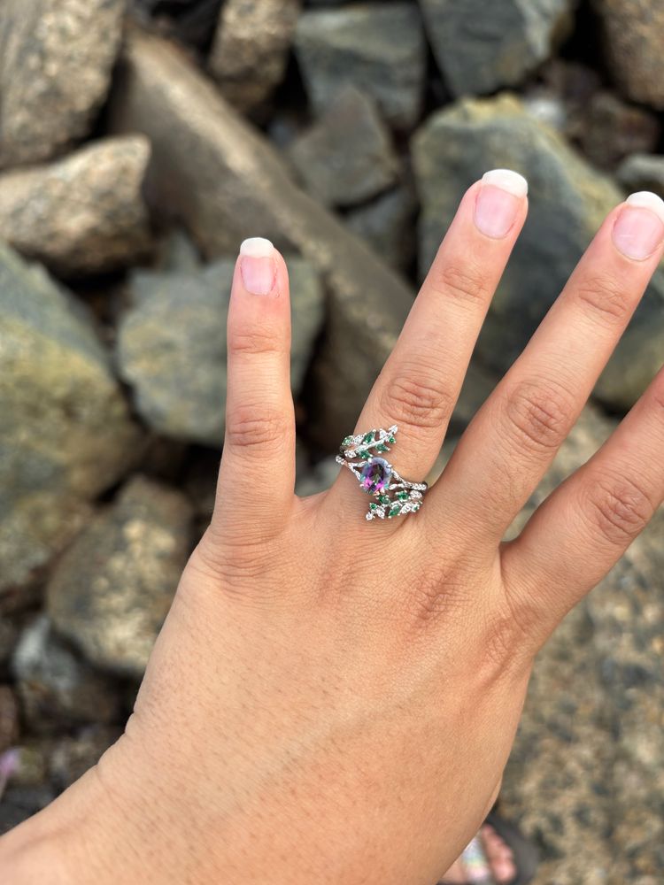 Mystic topaz engagement ring with green stones as leaves 