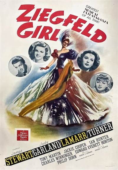 A poster from the 1941 film Ziegfeld Girl. A drawing of a showgirl is in the centers. Photos of stars Jimmy Stewart, Judy Garland, Hedy Lamarr, and Lana Turner are seen as circular insets on either side of the drawing. 