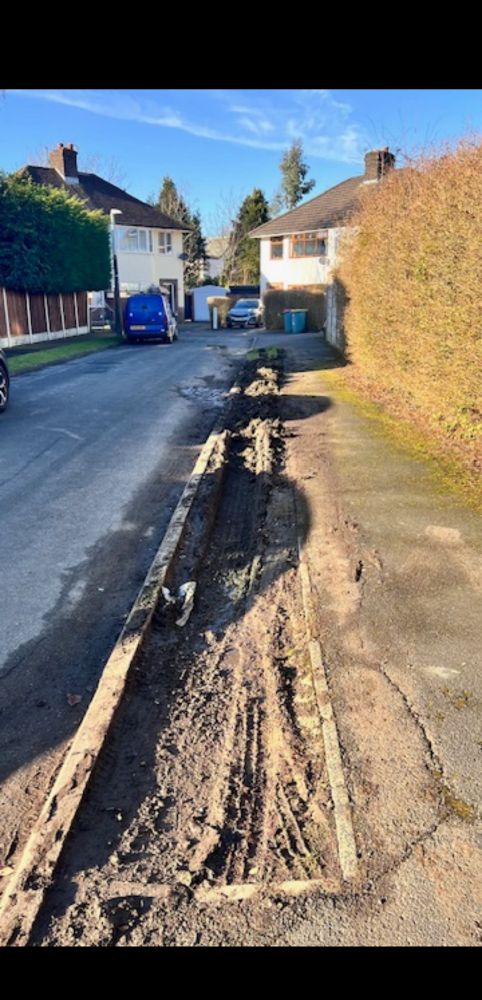 Very muddy and churned up grass verge of Greystock Avenue