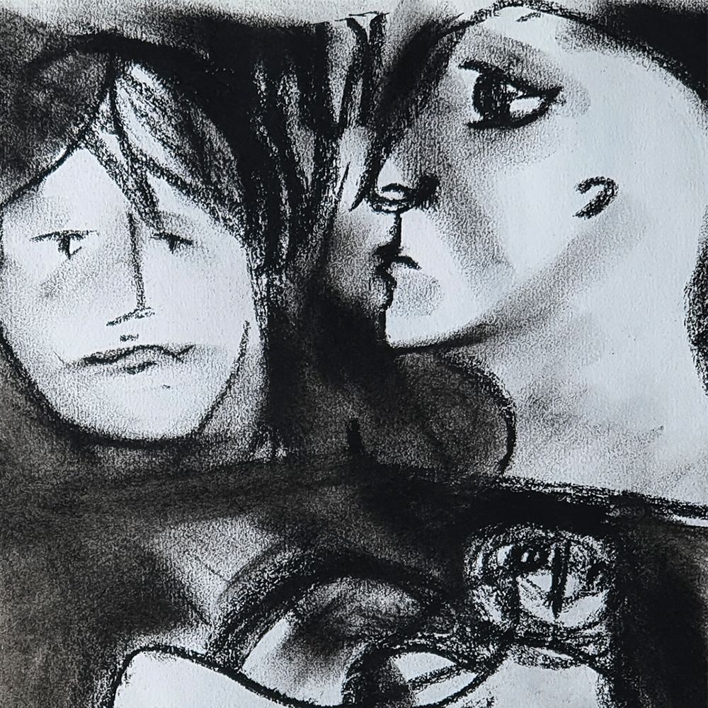 Two people are whispering to each other.