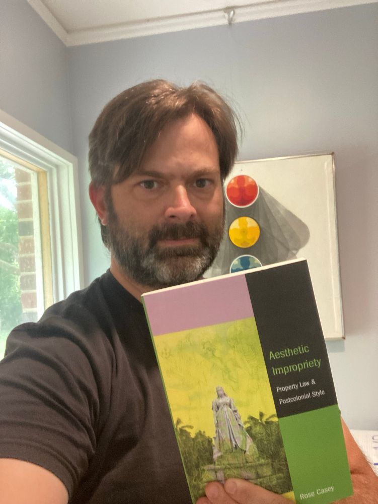 Brian holding a copy of Rose Casey’s awesome book, Aesthetic Impropriety 