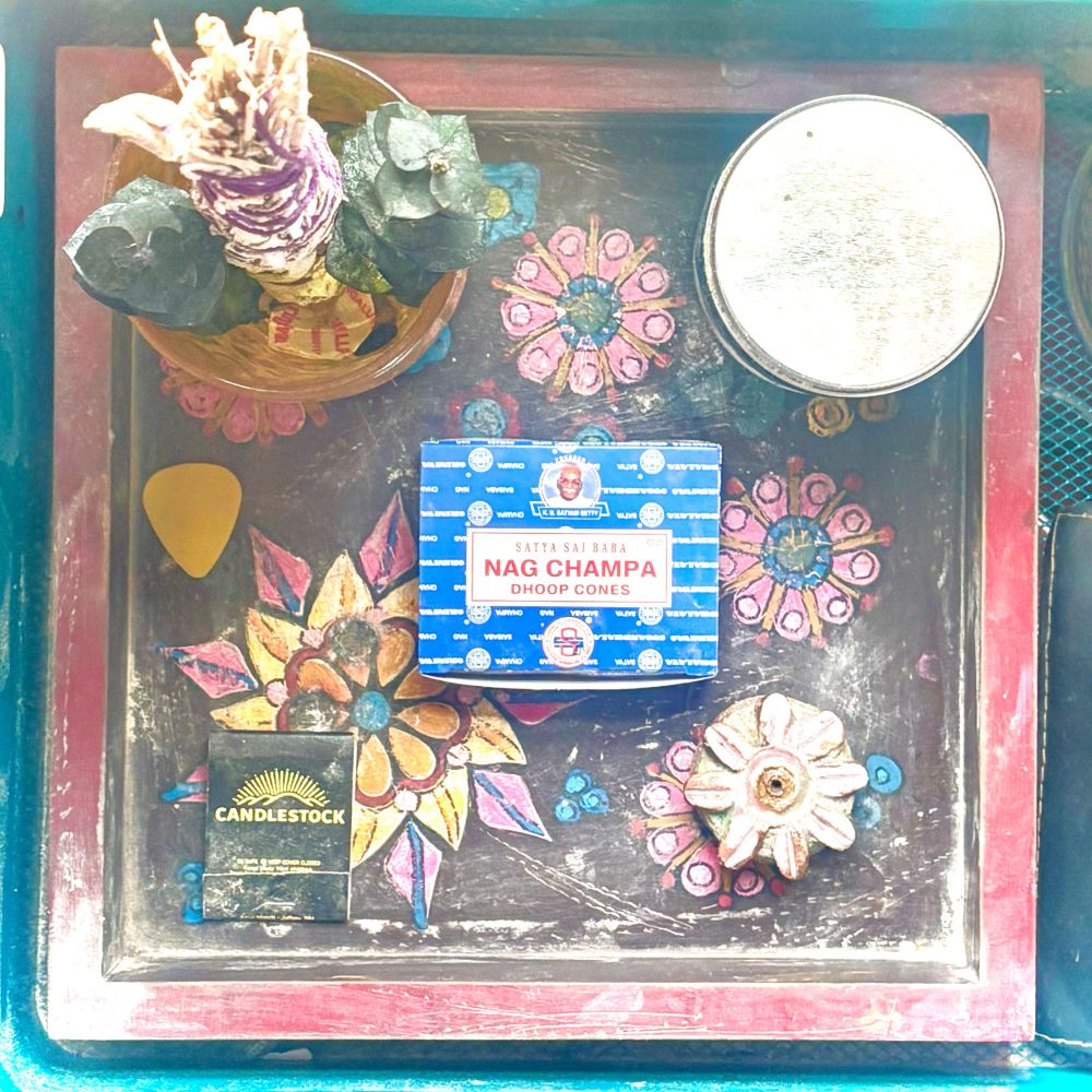 Compulsively curated collection of candle and cones.  Homemade.