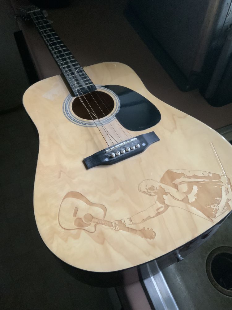 a dope-y TNA laser etched Jeff Jarrett guitar