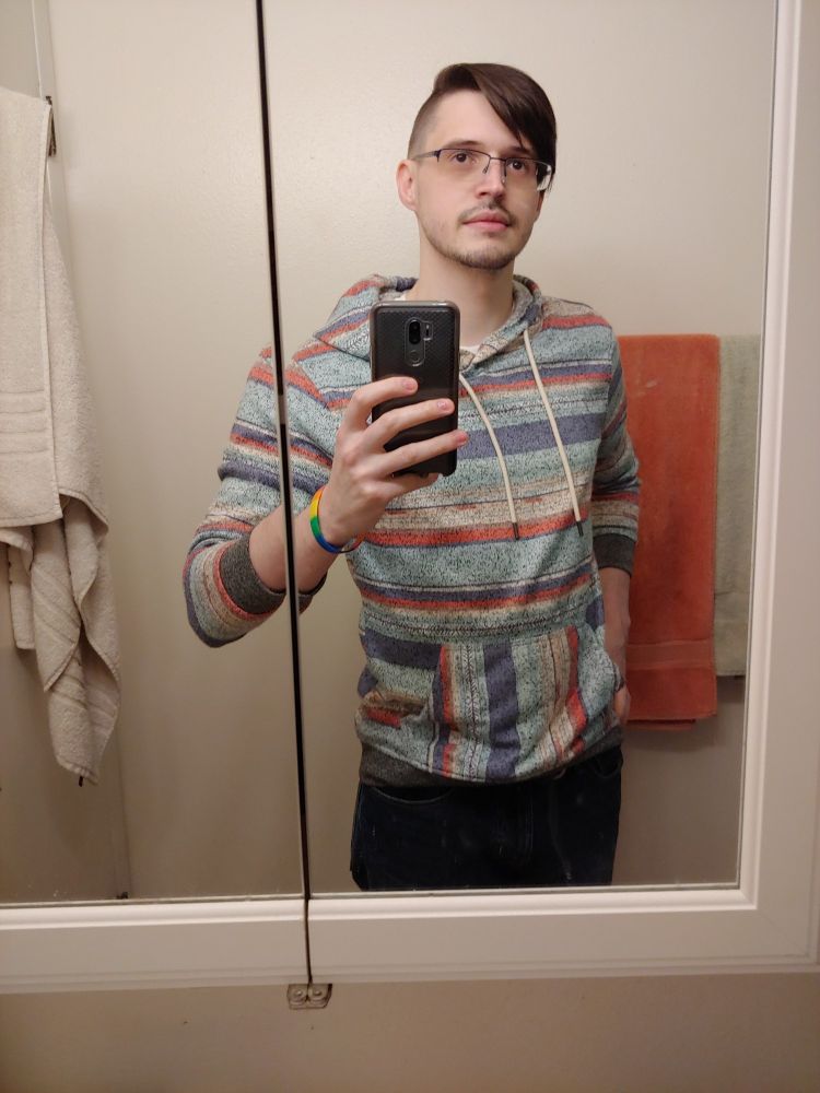 About 1.5 years pre transition. Rocking the undercut I would eventually commit to, albeit significantly shorter at the time.