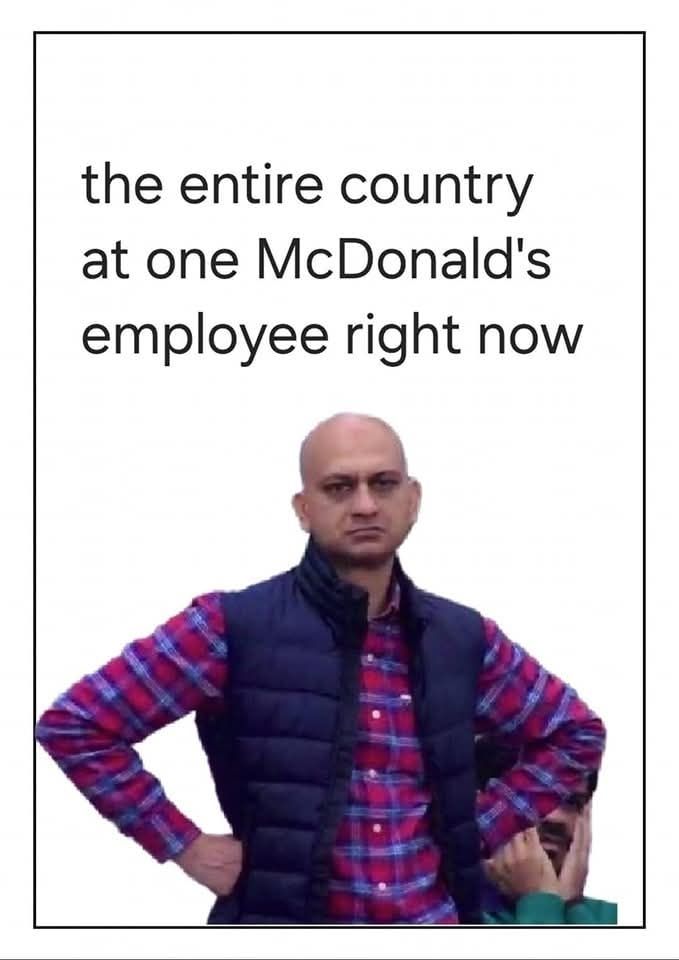Black text on a white background above the photo of a bald man with his hands on his hips, looking very disappointed. The text reads: the entire country at one McDonald's employee right now