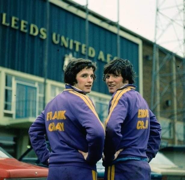 Frank and Eddie Gray, showing us their butts outside Elland Road. 