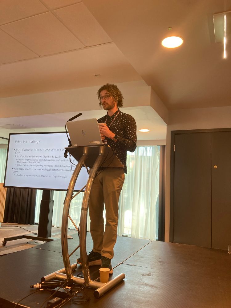 Phil Dawson giving a presentation at the assessment in higher education in Manchester 