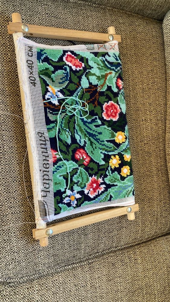 William Morris pattern tapestry of flowers and leaves