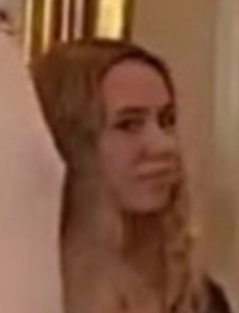 Female employee gives a side eye to Trump 