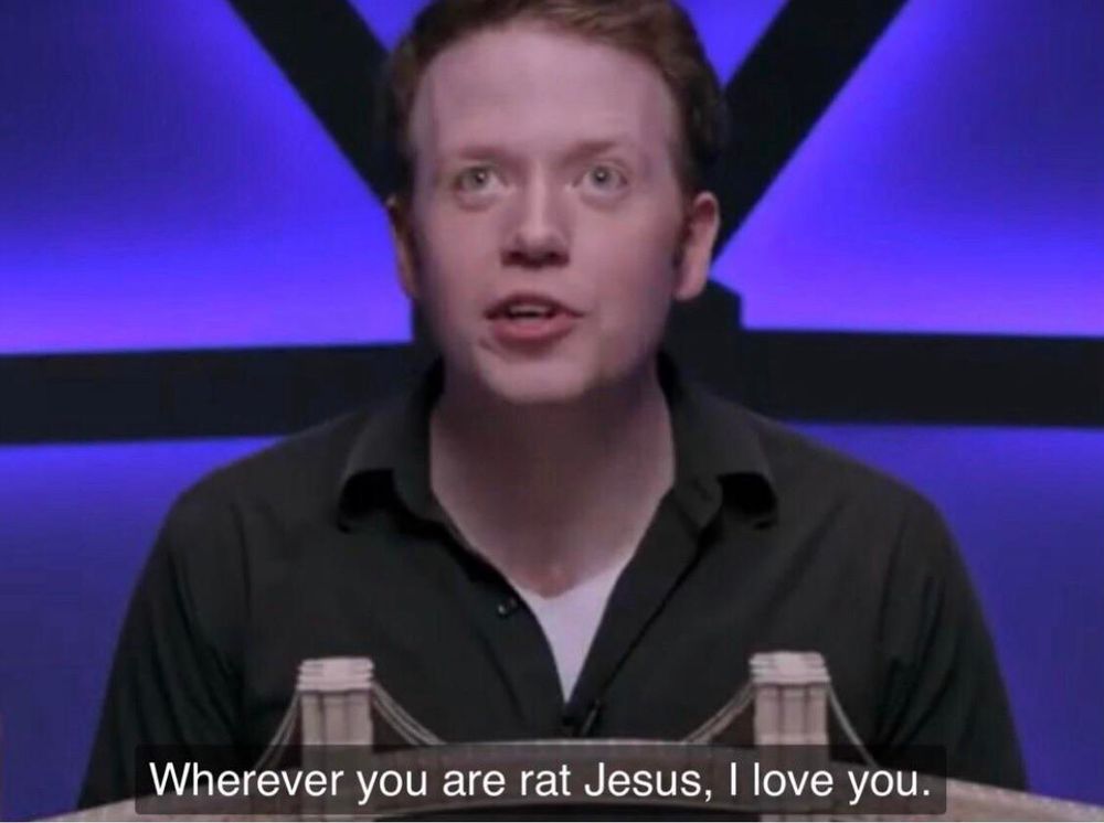 Brennan Lee Mulligan looking to the sky saying “wherever you are Rat Jesus, I love you”