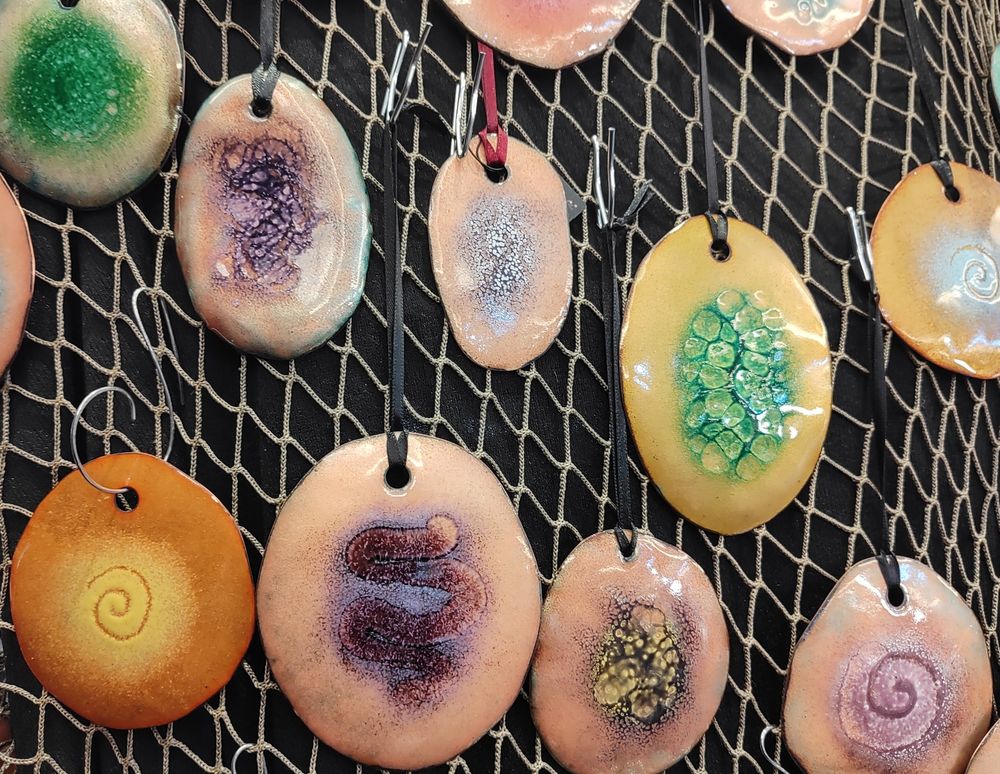 Hanging ornaments made of copper with kiln fired glass enamel color