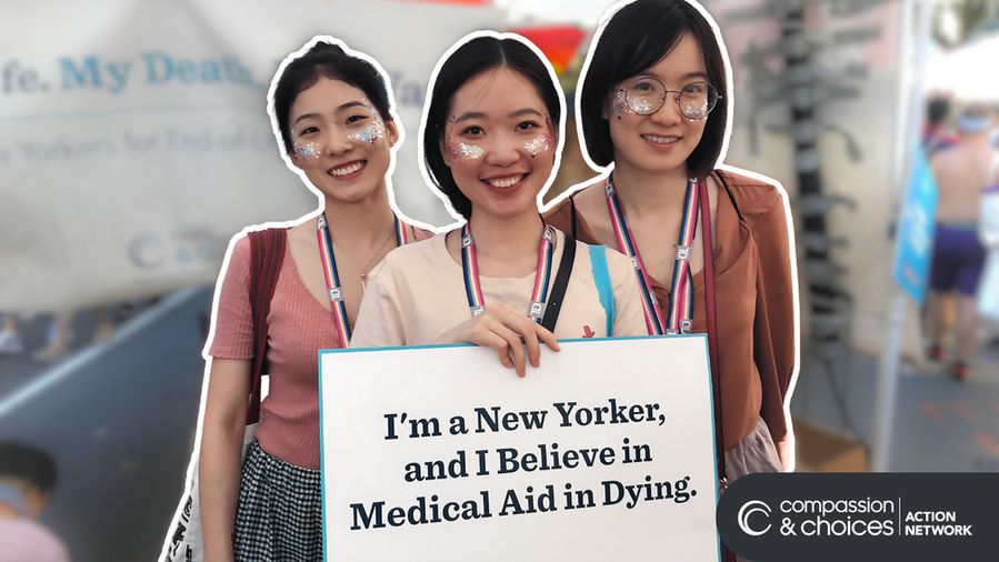 Three women are standing close together and smiling at the camera. They all are wearing rainbow lanyards and have on face glitter. The woman standing in the front is hold a poster that says "I'm a New Yorker, and I believe in Medical Aid in Dying." There is a Compassion & Choices Action Network logo on the bottom right of the image.