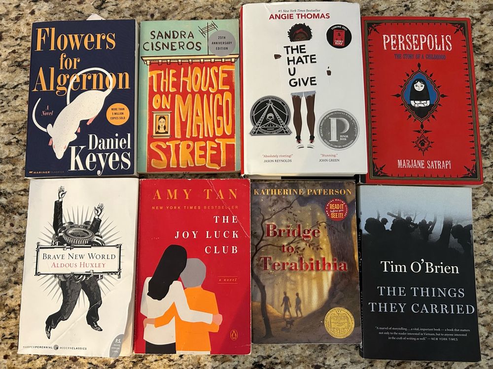 Banned books, flowers for algernon, brave new world, joy luck club, the house on mango street, the hate you give, persepolis, bridge to terabithia, the things they carried,  #bannedbooks #booksunbound #bookdragons #booksky