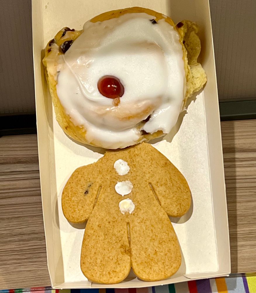Belgian bun acting as a head for a headless gingerbread man