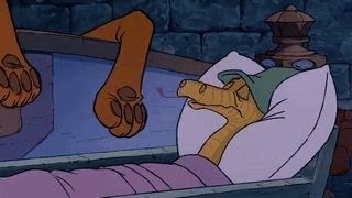 La serpiente amiga del rey Jorge en Robin Hood, durmiendo con gorro de dormir.