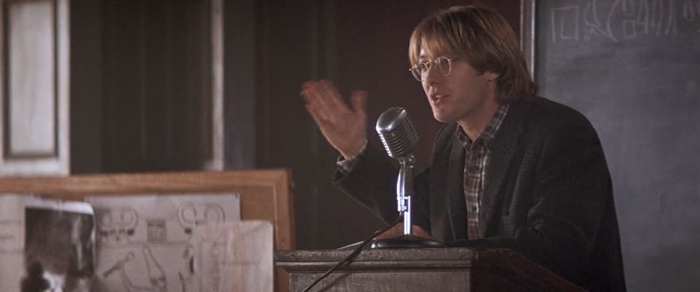 Daniel Jackson (James Spader) talking into a microphone.