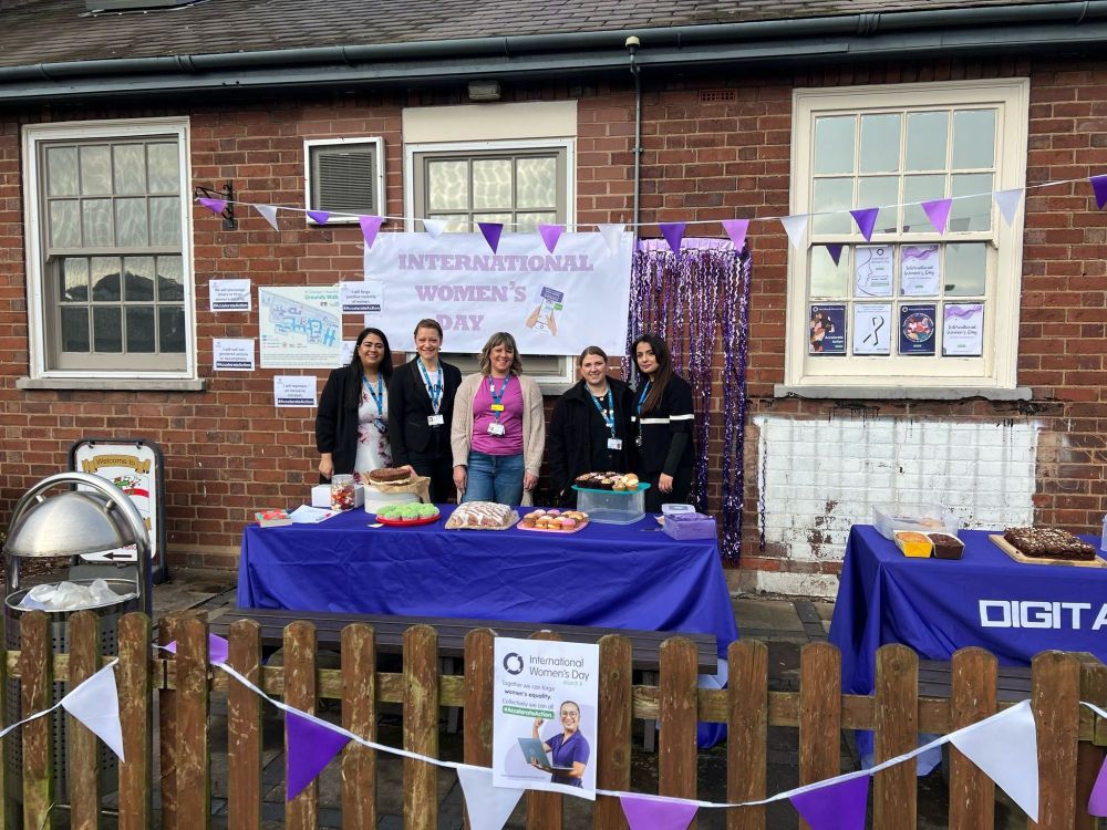 The MPFT Digital Team running a bake sale for White Ribbon in celebration for International Women's Day