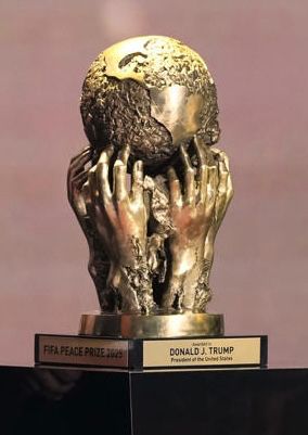 The FIFA Peace Prize: a gold Earth with hands reaching up to support or possibly claw at it. The hands are for some reason disintegrating or rotting in places and the globe is partly jagged like the wreckage of a bombed city or a drained, dessicated ocean. Winner: Trump

Photo: Associated Press 