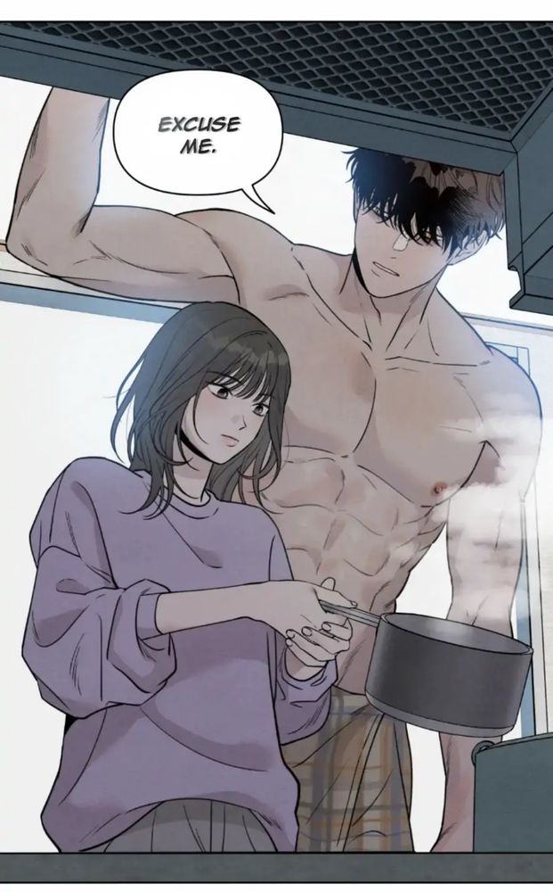 the girl is cooking, and the guy appears behind her, naked except for the blanket tied around his waist. He towers over her and says "Excuse me"