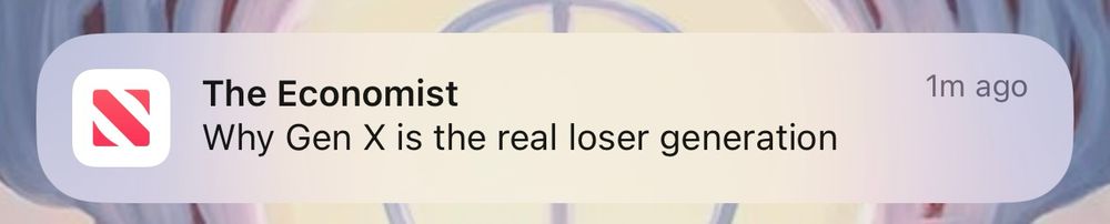An iPhone popup notification from The Economist, reading “Why Gen X is the real loser generation”