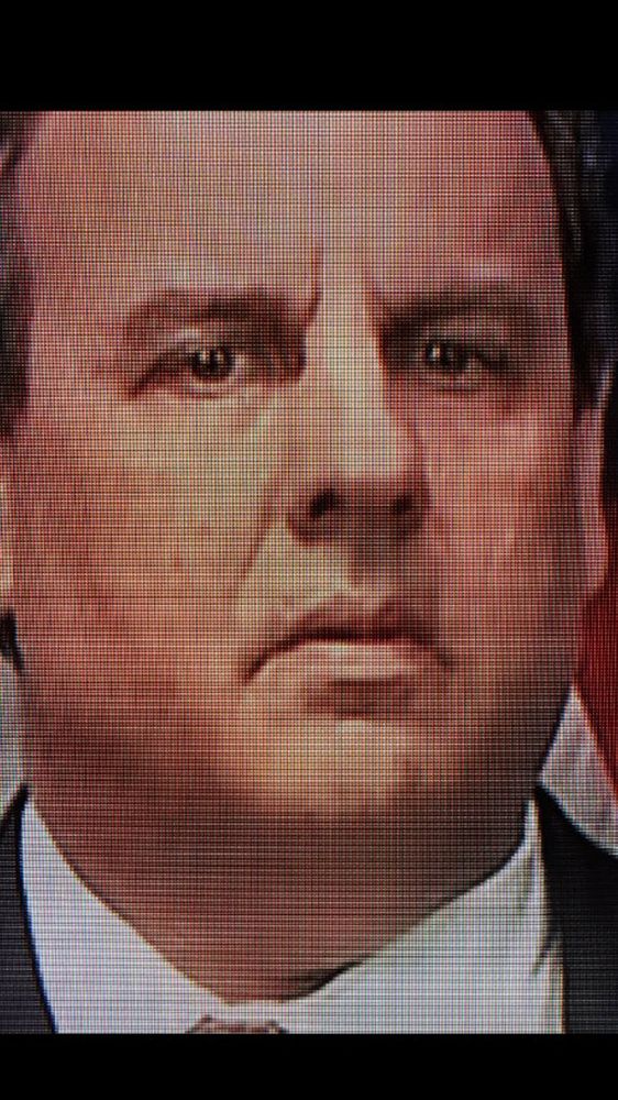 Chris Christie’s dead eyes at a lress conference in March 2016