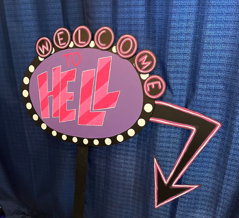 A recreation of the neon sign in Hazbin Hotel that reads “Welcome to Hell”
