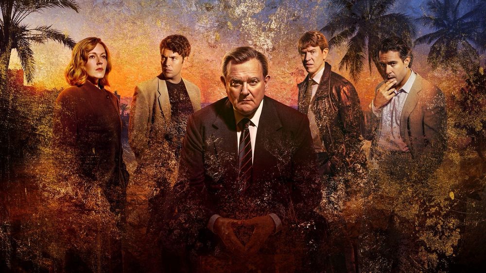 Promotional image for The Gold S2 showing 5 members of the cast surrounded by some insane foliage.

In the centre is Hugh Bonneville as Brian Boyce.

On the left is Charlotte Spencer as Nicki Jennings and Tom Hughes as Logan Campbell.

On the right is Sam Spruell as Charlie Miller and Tom Cullen as John Palmer.