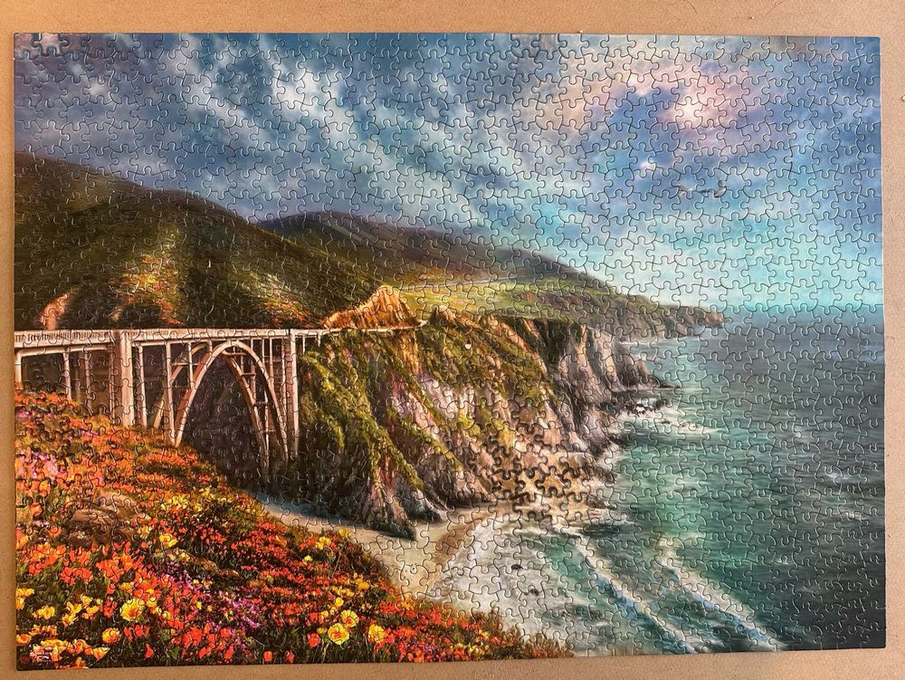Picture of Thomas Kincade puzzle. Bridge near the sea