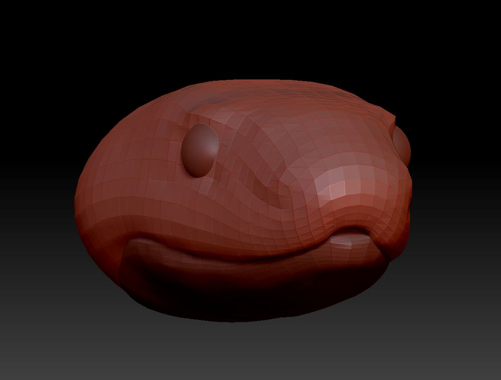 A low resolution sculpt of a snake head in the early stages of the sculpting process.