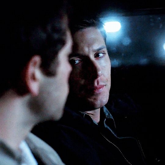 Dean and Castiel sharing a long look in the car, while driving at night. Watch the road, Dean! 