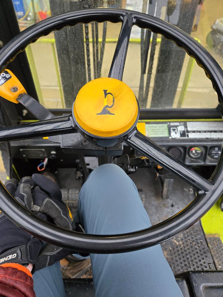 me operating a parked forklift