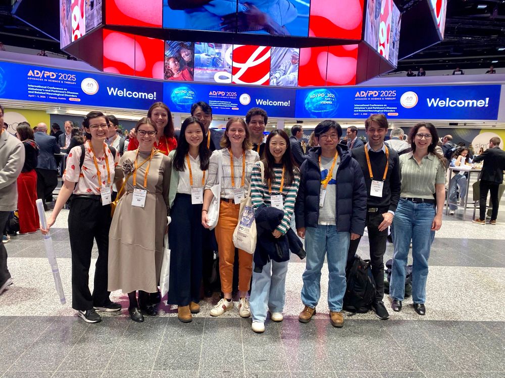 Group of 11 researchers from the Klenerman Lab, Cambridge, in the foyer of the ADPD 2025 conference