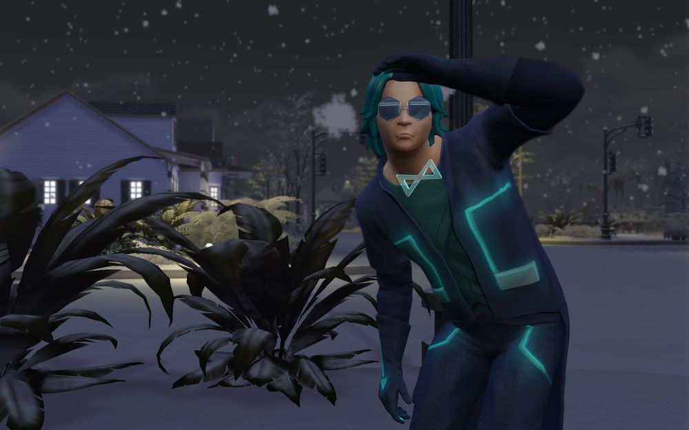 Emit puts his hand horizontally to his forehead, to cover his eyes from the falling snow as he looks around.