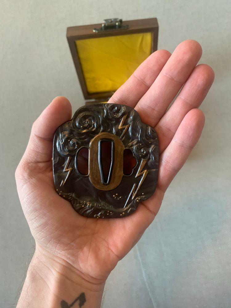 a recreation of jin’s tsuba made for SP employees