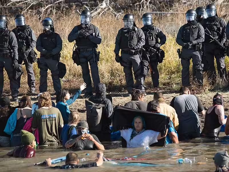 Armed thugs threatening peaceful protesters. In 2016. Under President Obama.