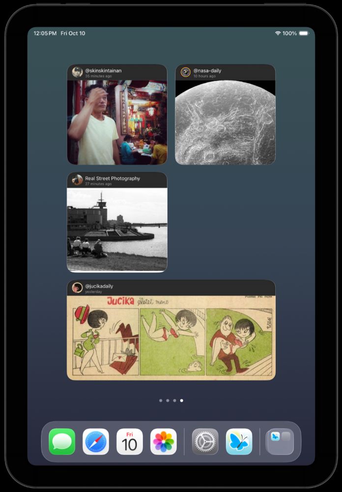 An iPad featuring art by the photographer Skinskin, daily photography from NASA, the Bluesky Real Street Photography feed, and 1960 comic strips Jucika.
